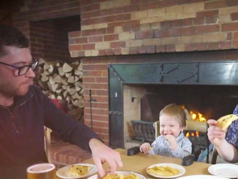 A family eating dinner at a table