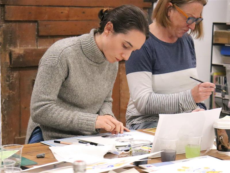 Students learning in our illustration workshop