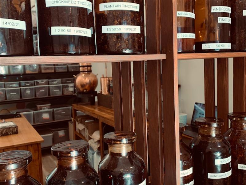 shelving with brown bottles lined up
