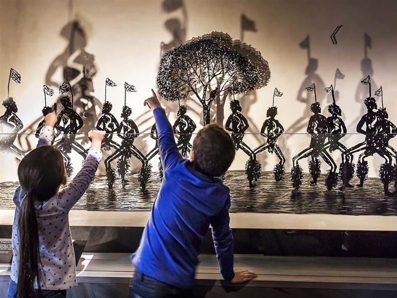 Children discovering First Peoples at Bunjilaka Aboriginal Cultural Centre, Melbourne Museum, Melbourne, Victoria, Australia