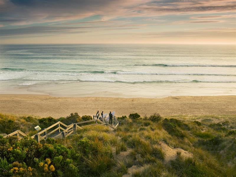 Surfers at Forrest Caves beach, Phillip Island, Victoria, Australia